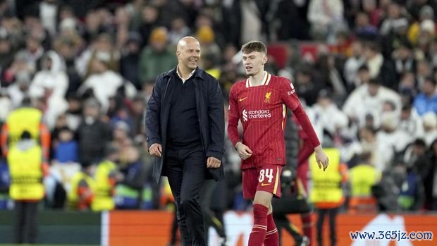 Conor Bradley Liverpool's manager Arne Slot and Liverpool's Conor Bradley react at the end of the Champions League opening phase soccer match between Liverpool and Real Madrid at Anfield Stadium, Liverpool, England, Wednesday, Nov. 27, 2024. (AP Photo/Jon Super)